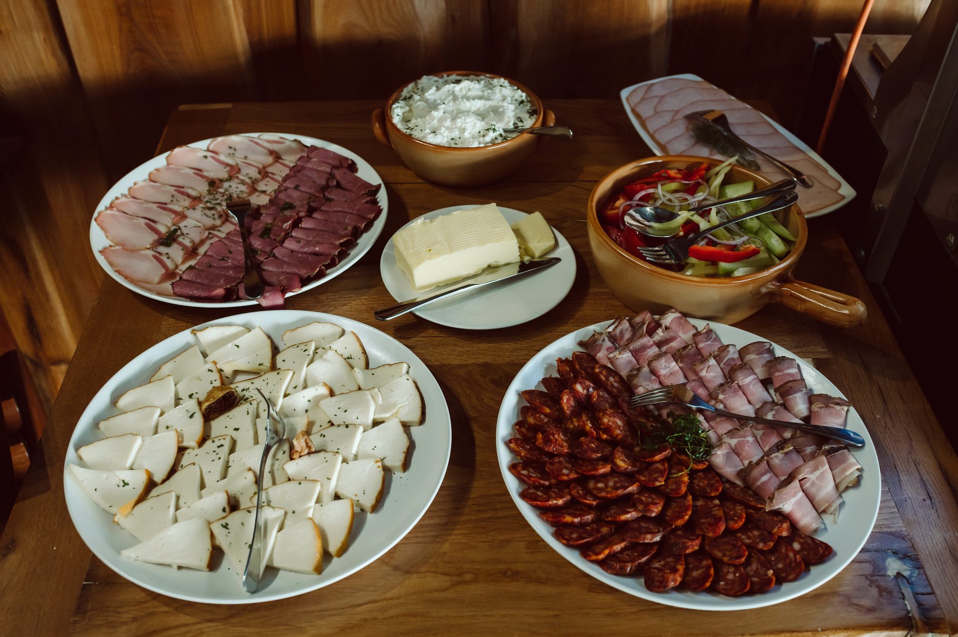 La Ursula table spread — cheeses, charcuterie and pickles
