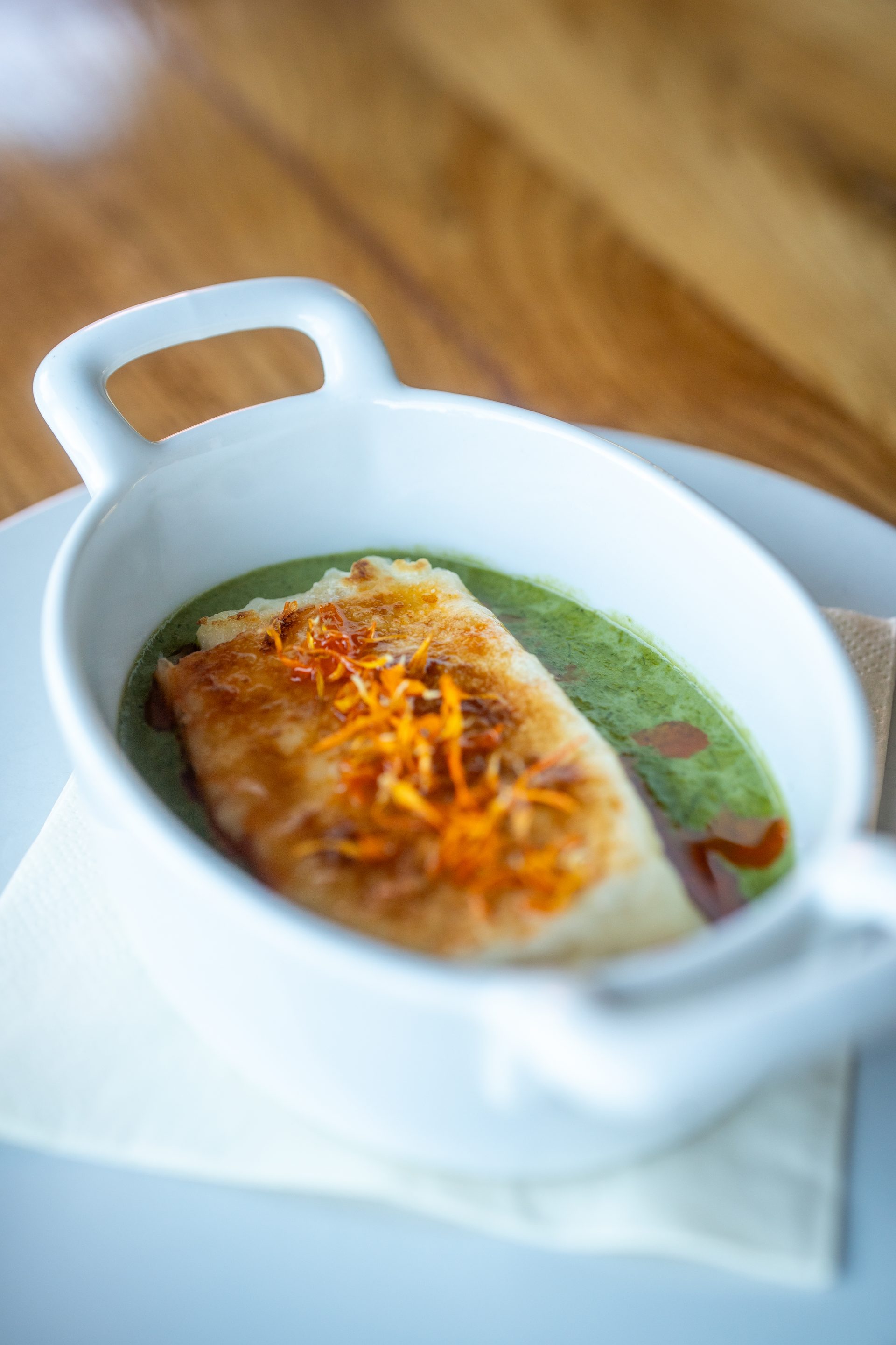 Štrukli baked in wild garlic cream — La Ursula signature
